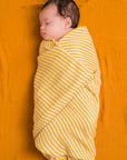 DockATot Swaddle - Golden Stripe / Pumpkin Spice